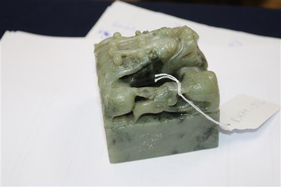A Chinese green stone dragon seal, 3.25in. (8.3cm)